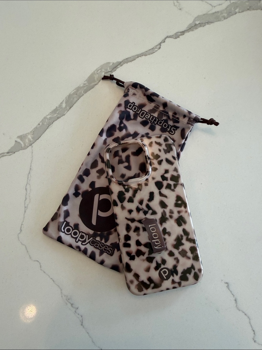 Loopy Case Black and White Speckled Tortoise Phone Case with Integrated Loop